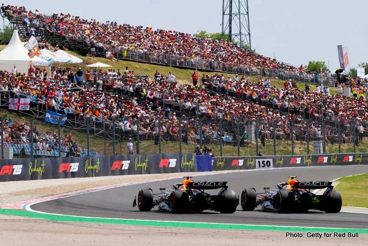 BUDAPEST, HUNGARY - AUGUST 02: Yuki Tsunoda of Japan driving the (22) Oracle Red Bull Racing RB21 leads Max Verstappen of the Netherlands driving the (1) Oracle Red Bull Racing RB21 on track during final practice ahead of the F1 Grand Prix of Hungary at Hungaroring on August 02, 2025 in Budapest, Hungary. (Photo by Rudy Carezzevoli/Getty Images) // Getty Images / Red Bull Content Pool // SI202508021587 // Usage for editorial use only //
