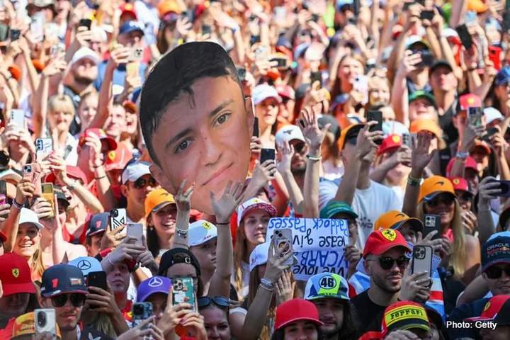 BUDAPEST, HUNGARY - AUGUST 01: Fans of Isack Hadjar of France and Visa Cash App Racing Bulls at the stage prior to practice ahead of the F1 Grand Prix of Hungary at Hungaroring on August 01, 2025 in Budapest, Hungary. (Photo by Rudy Carezzevoli/Getty Images) // Getty Images / Red Bull Content Pool // SI202508011280 // Usage for editorial use only //