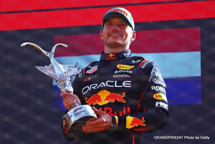 MONZA, ITALY - SEPTEMBER 07: Race winner Max Verstappen of the Netherlands and Oracle Red Bull Racing on the podium with the winners trophy during the F1 Grand Prix of Italy at Autodromo Nazionale Monza on September 07, 2025 in Monza, Italy. (Photo by Peter Fox/Getty Images) // Getty Images / Red Bull Content Pool // SI202509071024 // Usage for editorial use only //
