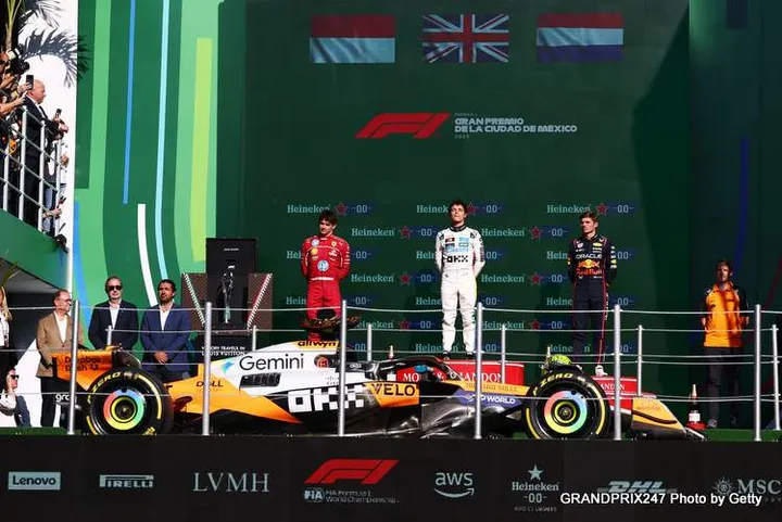 MEXICO CITY, MEXICO - OCTOBER 26: Race winner Lando Norris of Great Britain and McLaren Second placed Charles Leclerc of Monaco and Scuderia Ferrari and Third placed Max Verstappen of the Netherlands and Oracle Red Bull Racing on the podium during the F1 Grand Prix of Mexico at Autodromo Hermanos Rodriguez on October 26, 2025 in Mexico City, Mexico. (Photo by Clive Rose/Getty Images) // Getty Images / Red Bull Content Pool // SI202510260873 // Usage for editorial use only //