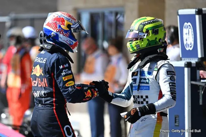 AUSTIN, TEXAS - OCTOBER 19: Race winner Max Verstappen of the Netherlands and Oracle Red Bull Racing and Second placed Lando Norris of Great Britain and McLaren congratulate each other in parc ferme during the F1 Grand Prix of United States at Circuit of The Americas on October 19, 2025 in Austin, Texas. (Photo by Simon Galloway/LAT Images) // Getty Images / Red Bull Content Pool // SI202510191329 // Usage for editorial use only //