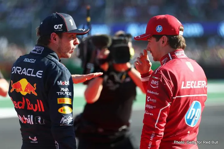 MEXICO CITY, MEXICO - OCTOBER 26: Second placed Charles Leclerc of Monaco and Scuderia Ferrari and Third placed Max Verstappen of the Netherlands and Oracle Red Bull Racing talk in parc ferme during the F1 Grand Prix of Mexico at Autodromo Hermanos Rodriguez on October 26, 2025 in Mexico City, Mexico. (Photo by Mark Thompson/Getty Images) // Getty Images / Red Bull Content Pool // SI202510270014 // Usage for editorial use only //