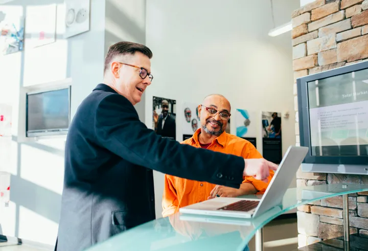 unknown person using laptop Sell Your Vehicle with Confidence: Top Tips for a Successful Sale