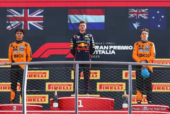 MONZA, ITALY - SEPTEMBER 07: Race winner Max Verstappen of the Netherlands and Oracle Red Bull Racing Second placed Lando Norris of Great Britain and McLaren Third placed Oscar Piastri of Australia and McLaren and Pierre Wache, Technical Director of Oracle Red Bull Racing on the podium during the F1 Grand Prix of Italy at Autodromo Nazionale Monza on September 07, 2025 in Monza, Italy. (Photo by Clive Rose/Getty Images) // Getty Images / Red Bull Content Pool // SI202509070948 // Usage for editorial use only //