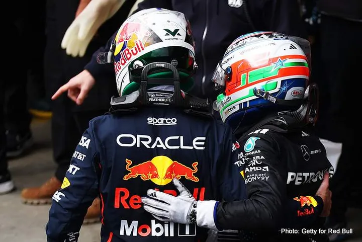 SAO PAULO, BRAZIL - NOVEMBER 09: Second placed Andrea Kimi Antonelli of Italy and Mercedes AMG Petronas F1 Team and Third placed Max Verstappen of the Netherlands and Oracle Red Bull Racing congratulate each other in parc ferme during the F1 Grand Prix of Brazil at Autodromo Jose Carlos Pace on November 09, 2025 in Sao Paulo, Brazil. (Photo by Zak Mauger/LAT Images) // Getty Images / Red Bull Content Pool // SI202511090698 // Usage for editorial use only //