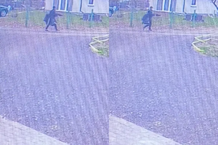 Žmogus su galimai šautuvu / Skaitytojo vaizdo įrašo stop kadro nuotr. / „Kas vyksta Kaune“ montažas