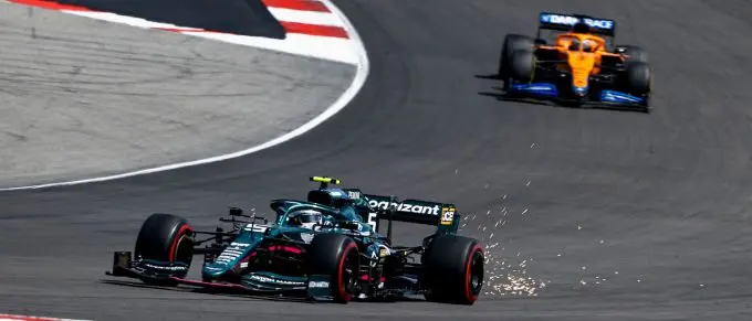 GP2103_Portugal_Vettel_powers_down_the_hill_at_the_Algarve_International_Circuit