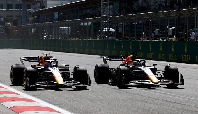 Max Verstappen passes Sergio Perez