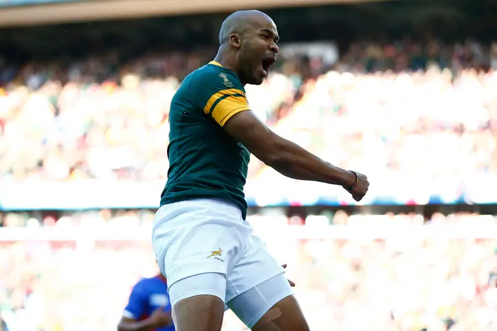 BIRMINGHAM, ENGLAND - SEPTEMBER 26: JP Pietersen of South Africa celebrates scoring the opening try during the 2015 Rugby World Cup Pool B match between South Africa and Samoa at Villa Park on September 26, 2015 in Birmingham, United Kingdom. (Photo by La
