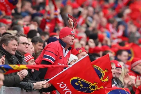 LIMERICK, IRELAND - APRIL 08: Munster fans support their team during the Heineken Cup quarter final match between Munster and Ulster at Thomond Park on April 8, 2012 in Limerick, Ireland. (Photo by David Rogers/Getty Images)
