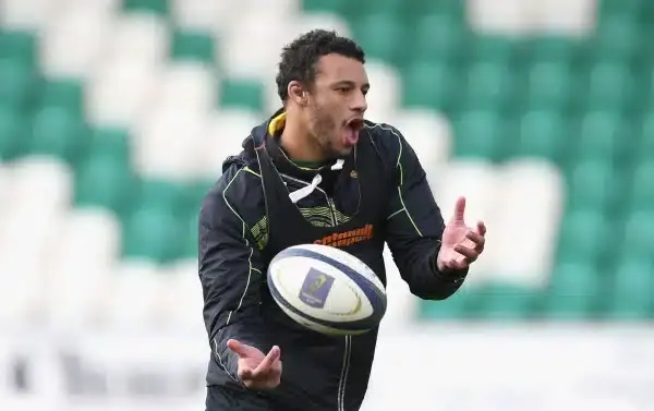 NORTHAMPTON, ENGLAND - APRIL 01: Courtney Lawes passes the ball during the Northampton Saints training session held on April 1, 2015 in Northampton, England. (Photo by David Rogers/Getty Images)
