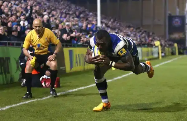 BATH, ENGLAND - APRIL 24: Semesa Rokoduguni of Bath dives in to score their fifth try during the Aviva Premiership match between Bath and London Irish at the Recreation Ground on April 24, 2015 in Bath, England. (Photo by David Rogers/Getty Images)