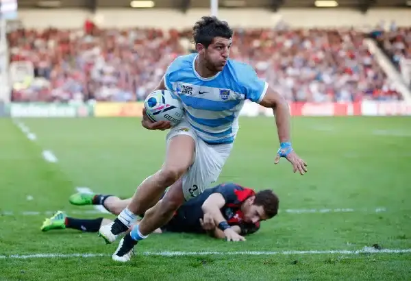 GLOUCESTER, ENGLAND - SEPTEMBER 25: Tomas Cubelli of Argentina is tackled by Vasil Lobzhanidze of Georgia on the way to scoring his teams second try during the 2015 Rugby World Cup Pool C match between Argentina and Georgia at Kingsholm Stadium on Septemb