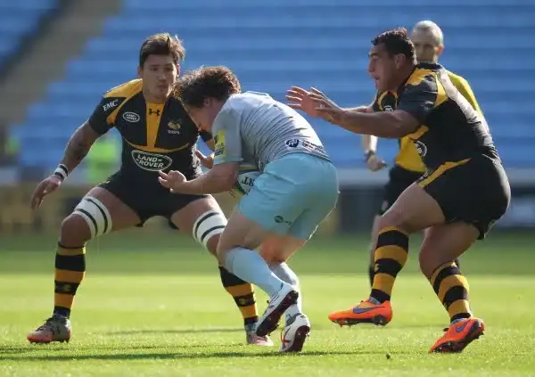 COVENTRY, ENGLAND - OCTOBER 04: Guy Thompson of Wasps and Jamie Elliott of Northampton Saints (centre) and George Smith of Wasps in action during the pre season friendly match between Wasps and Northampton Saints at The Ricoh Arena on October 4, 2015 in C