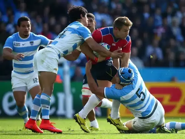LEICESTER, ENGLAND - OCTOBER 11 : Johan Deysel of Namibia is tackles by Matias Alemanno and Matias Moroni of Argentina during the 2015 Rugby World Cup Pool C match between Argentina and Namibia at Leicester City Stadium on October 11, 2015 in Leicester, U