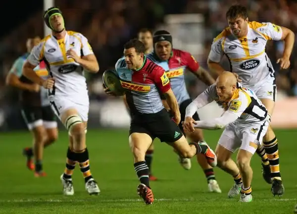 LONDON, ENGLAND - OCTOBER 16:  Harlequins scrum half Karl Dickson beats the tackle of Joe Simpson of Wasps during the Aviva Premiership match between Harlequins and Wasps at Twickenham Stoop on October 16, 2015 in London, England.  (Photo by Harry Engels/