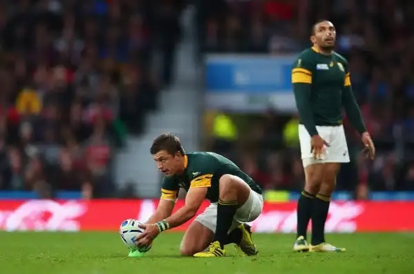 LONDON, ENGLAND - OCTOBER 17: Handre Pollard of South Africa lines up a kick watched by Bryan Habana of South Africa during the 2015 Rugby World Cup Quarter Final match between South Africa and Wales at Twickenham Stadium on October 17, 2015 in London, Un