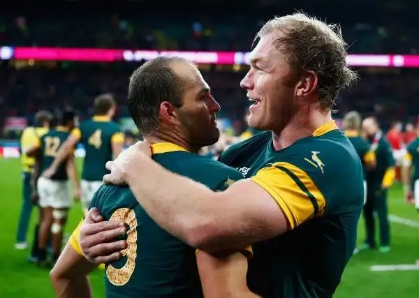 LONDON, ENGLAND - OCTOBER 17: a jubilant Schalk Burger of South Africa (R) and Fourie Du Preez of South Africa enbrace following victory in the 2015 Rugby World Cup Quarter Final match between South Africa and Wales at Twickenham Stadium on October 17, 20