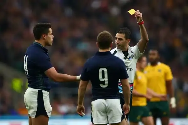 LONDON, ENGLAND - OCTOBER 18: Referee Craig Joubert shows the yellow card to Sean Maitland (L) of Scotland during the 2015 Rugby World Cup Quarter Final match between Australia and Scotland at Twickenham Stadium on October 18, 2015 in London, United Kingd
