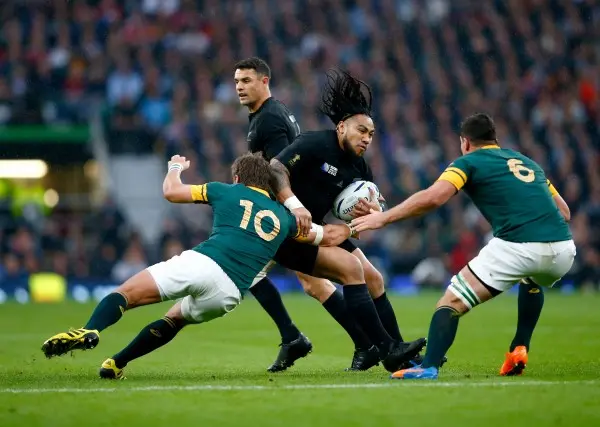 LONDON, ENGLAND - OCTOBER 24: Ma'a Nonu of the New Zealand All Blacks is tackled by Handre Pollard (l) and Francois Louw (6) of South Africa during the 2015 Rugby World Cup Semi Final match between South Africa and New Zealand at Twickenham Stadium on Oct