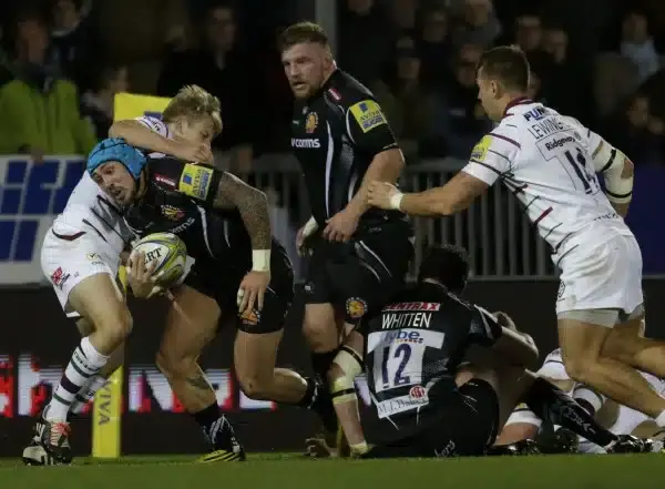 EXETER, ENGLAND - OCTOBER 24: Jack Nowell of Exeter Chiefs attempts to grt through the defence of London Irish during the Aviva Premiership Match between Exeter Chiefs and London Irish at Sandy Park on October 24, 2015 in Exeter, England. (Photo by Getty 