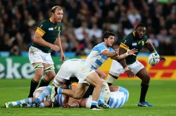 LONDON, ENGLAND - OCTOBER 30: Tomas Cubelli of Argentina passes the ball out during the 2015 Rugby World Cup Bronze Final match between South Africa and Argentina at the Olympic Stadium on October 30, 2015 in London, United Kingdom. (Photo by David Rogers
