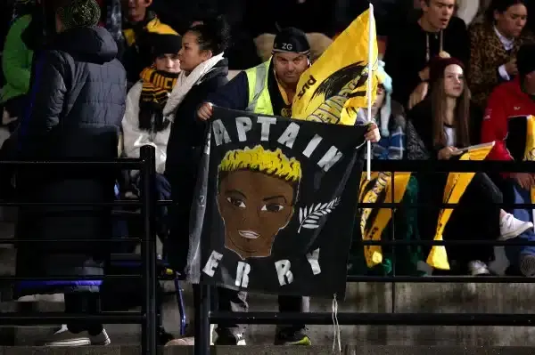 NAPIER, NEW ZEALAND - JUNE 05: A Hurricanes fan holds a banner in memory of Jerry Collins during the round 17 Super Rugby match between the Hurricanes and the Highlanders at McLean Park on June 5, 2015 in Napier, New Zealand. (Photo by Joel Ford/Getty Ima
