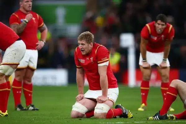 LONDON, ENGLAND - OCTOBER 17: A dejected Bradley Davies of Wales kneels on the pitch following the 2015 Rugby World Cup Quarter Final match between South Africa and Wales at Twickenham Stadium on October 17, 2015 in London, United Kingdom. (Photo by Steve