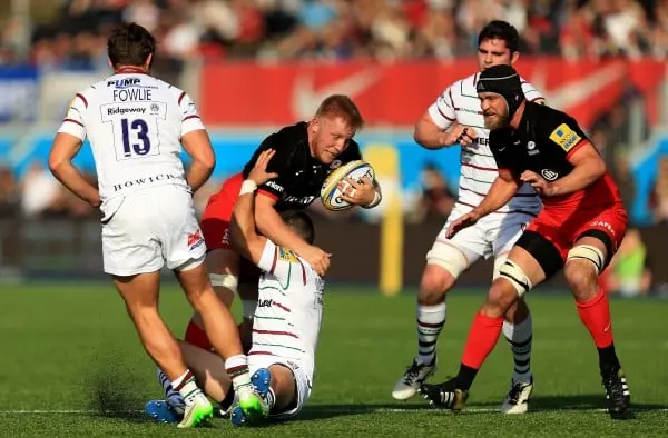 BARNET, ENGLAND - OCTOBER 31: Jackson Wray of Saracens is tackled by Fergus Mulchrone of London Irish during the Aviva Premiership match between Saracens and London Irish at Allianz Park stadium on October 31, 2015 in Barnet, England. (Photo by Stephen Po