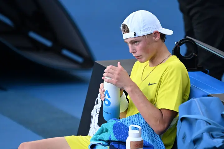 Cruz Hewitt sitting down in his chair
