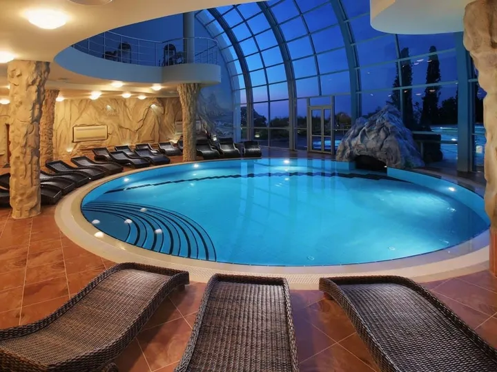 another community amenity is the pool which is set within breathtaking glass windows on one side