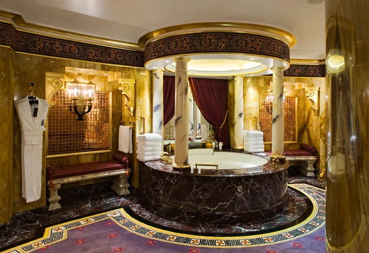 each bedroom has an adjoining marble bathroom with spa bath and walk in shower