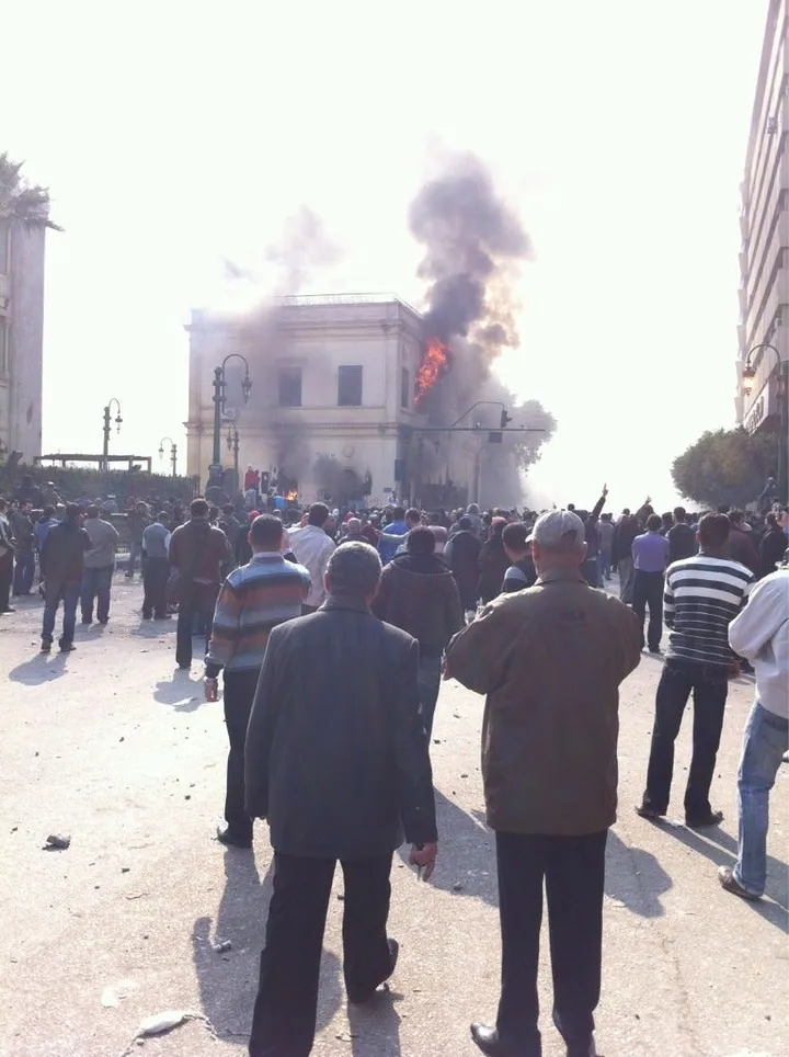 sharifkouddous large explosion blows out widows of building fire raging inside