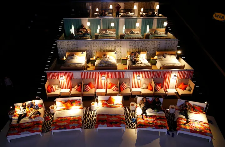 spectators await the start of a cinema screening at a kinostar de lux multiplex in russia on dec 7 ikea converted one of the cinema halls completely replacing standard seats with their furniture
